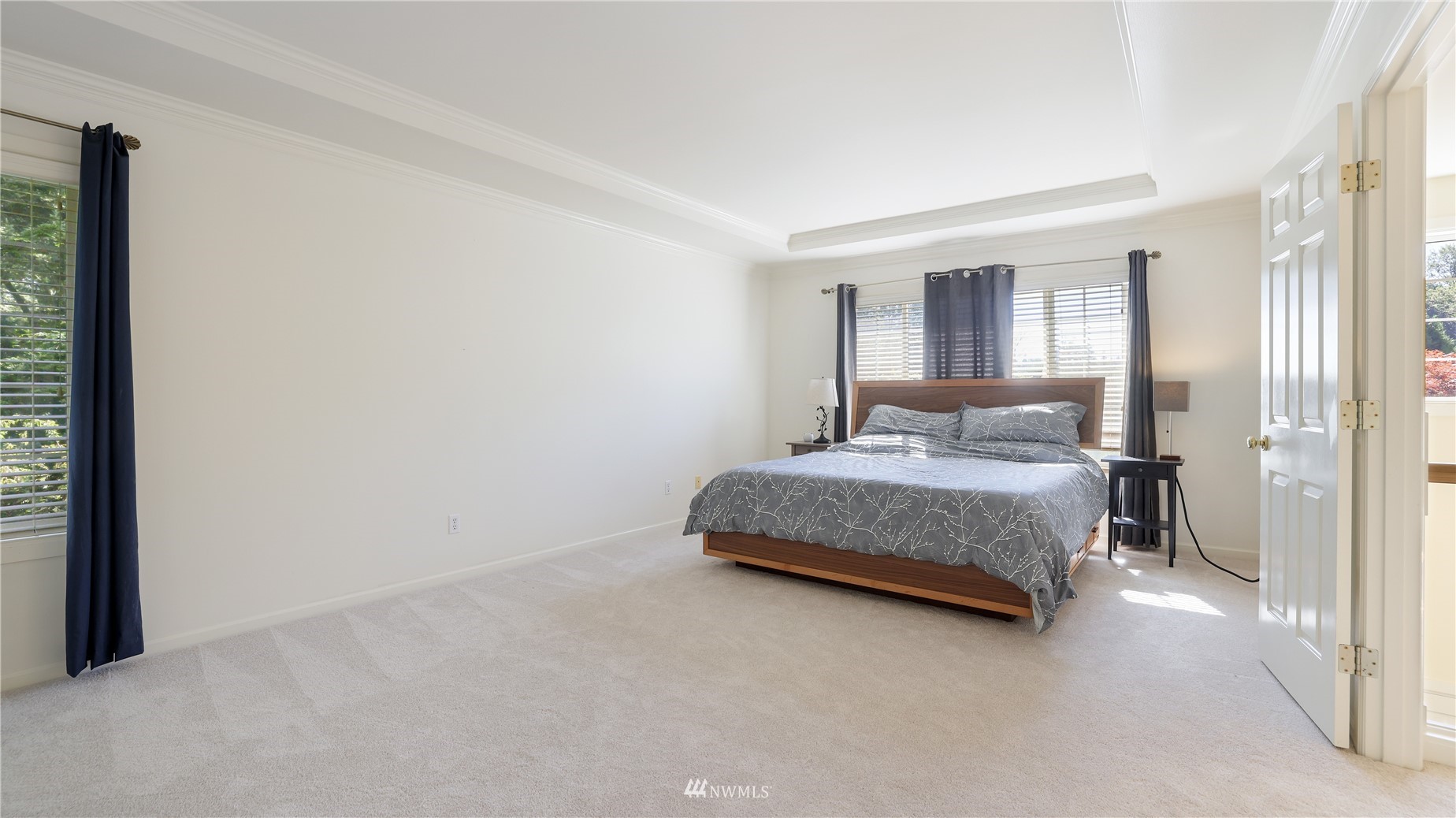 16038 Southeast 125th Street Renton, WA 98059 - Photo 23 of 34 a bedroom with a bed and a night stand