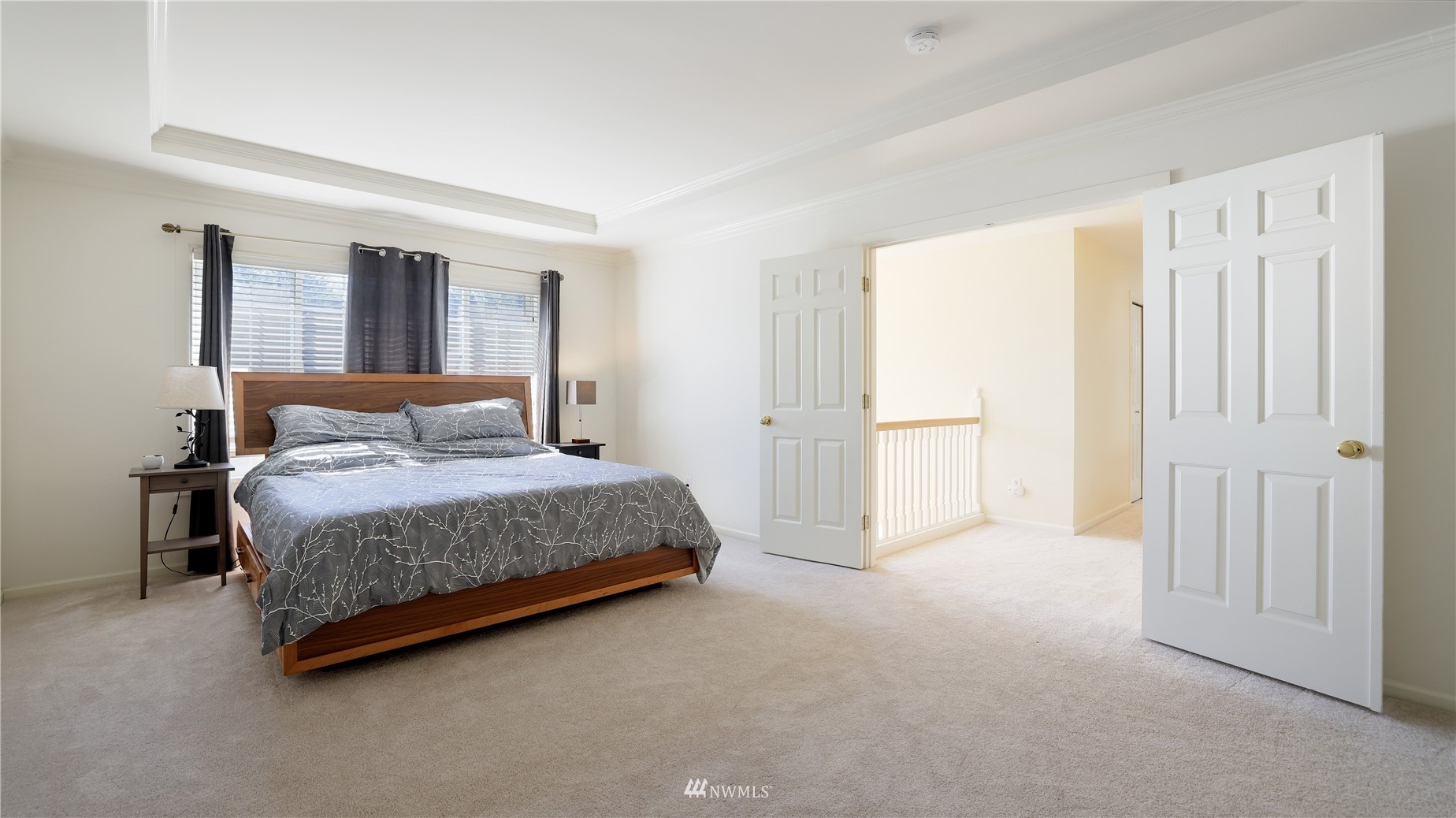 16038 Southeast 125th Street Renton, WA 98059 - Photo 24 of 34 a bedroom with a bed and a painting