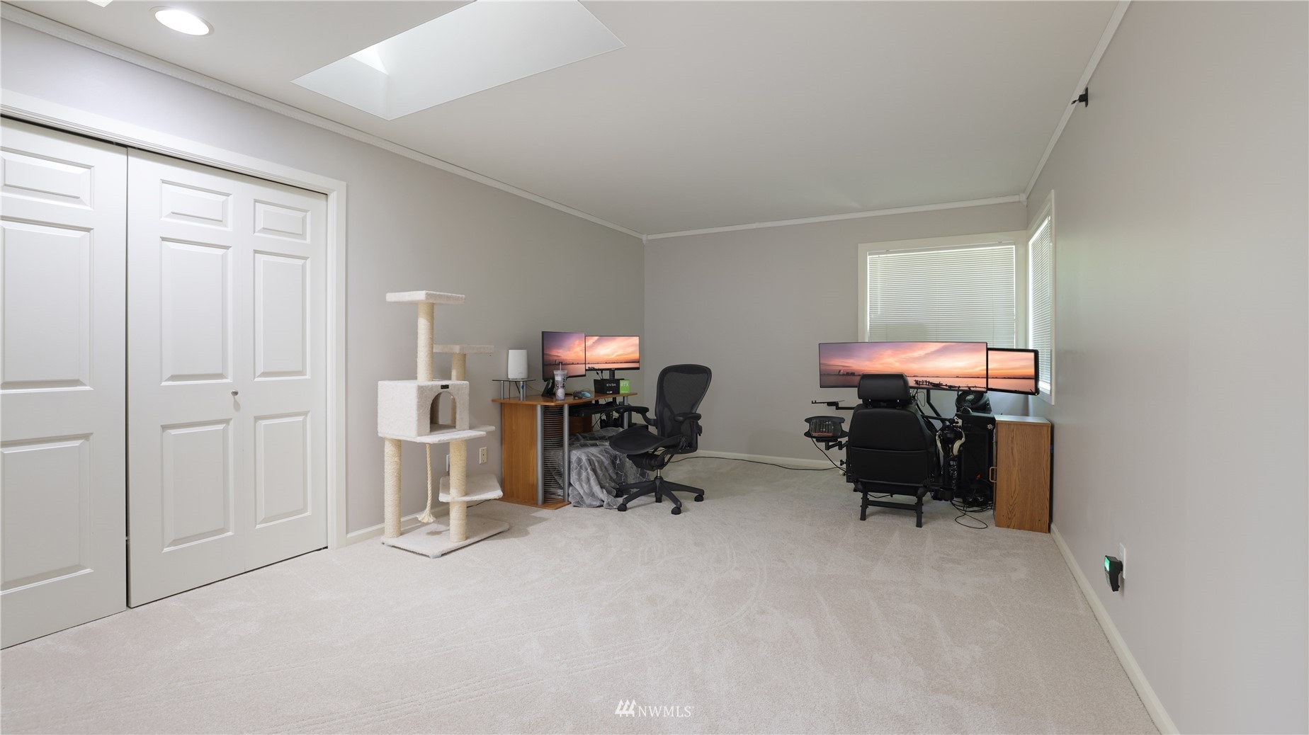 16038 Southeast 125th Street Renton, WA 98059 - Photo 28 of 34 a view of room with workspace and mirror in ceiling window