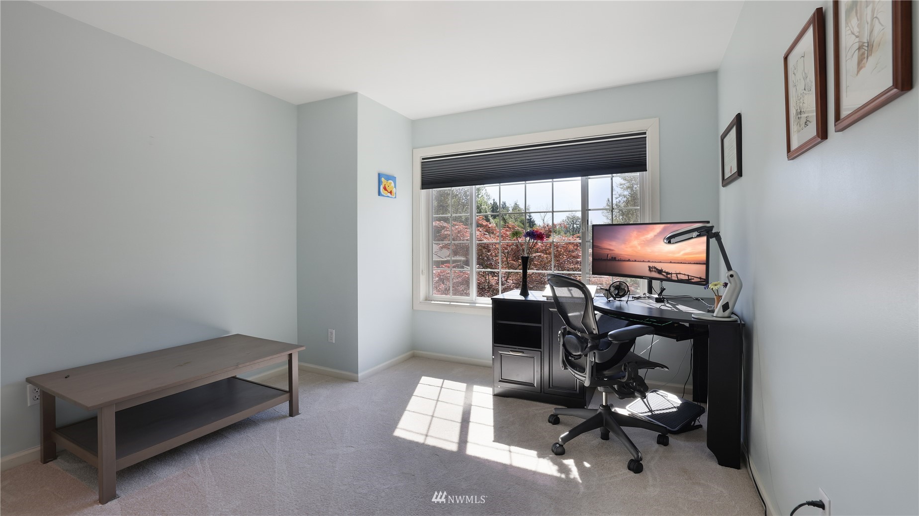 16038 Southeast 125th Street Renton, WA 98059 - Photo 29 of 34 a room with furniture and a flat screen tv