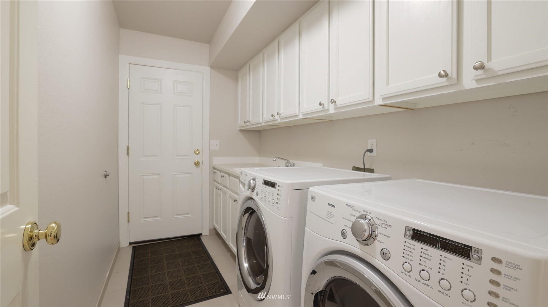 16038 Southeast 125th Street Renton, WA 98059 - Photo 31 of 34 a utility room with dryer and washer