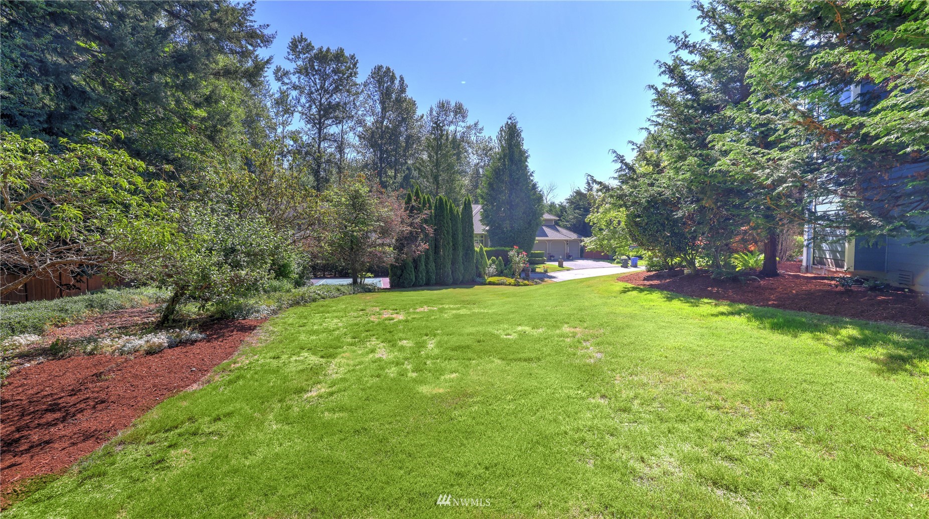 16038 Southeast 125th Street Renton, WA 98059 - Photo 5 of 34 a view of a park with large trees