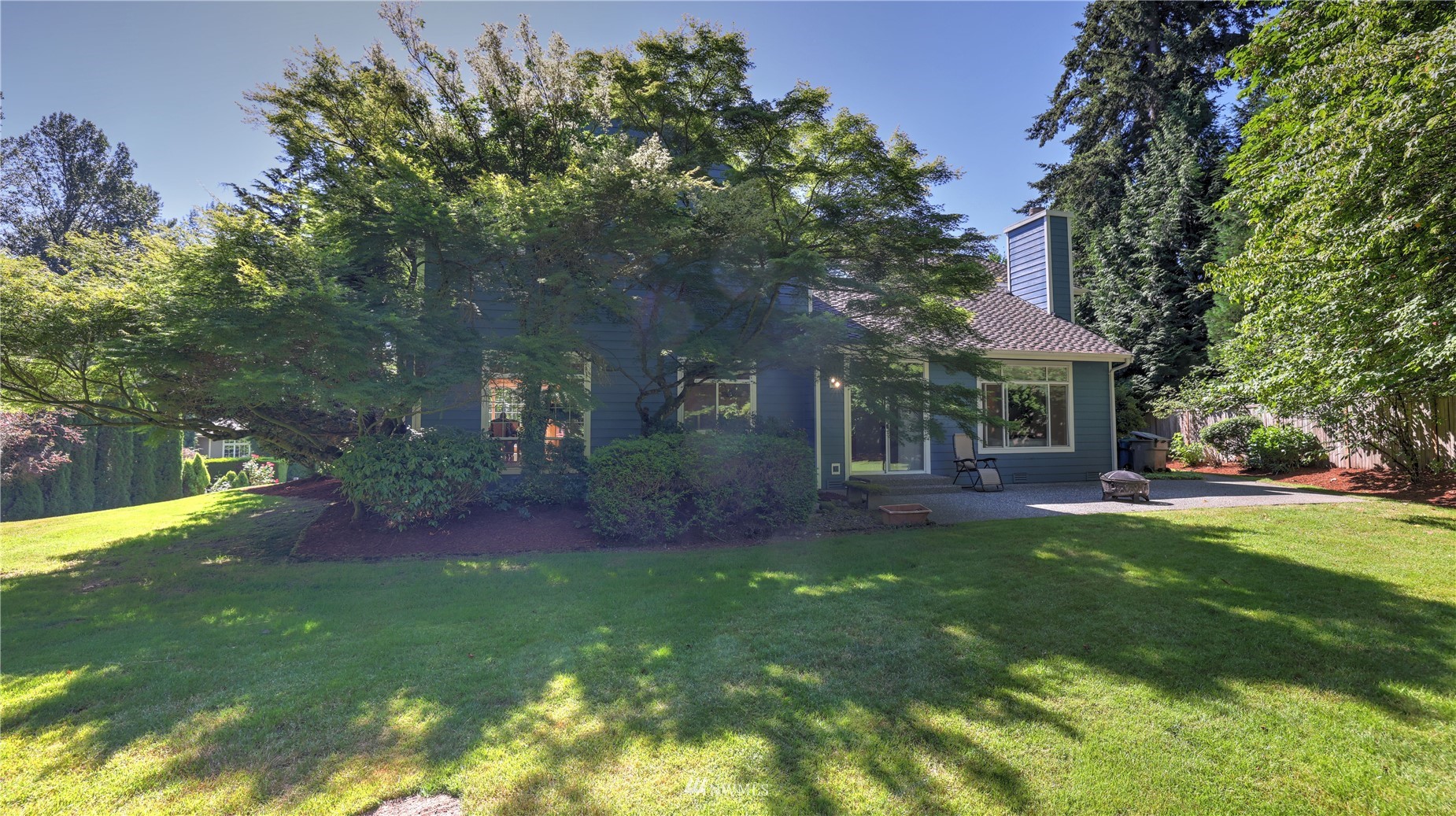 16038 Southeast 125th Street Renton, WA 98059 - Photo 6 of 34 a view of a house with a yard