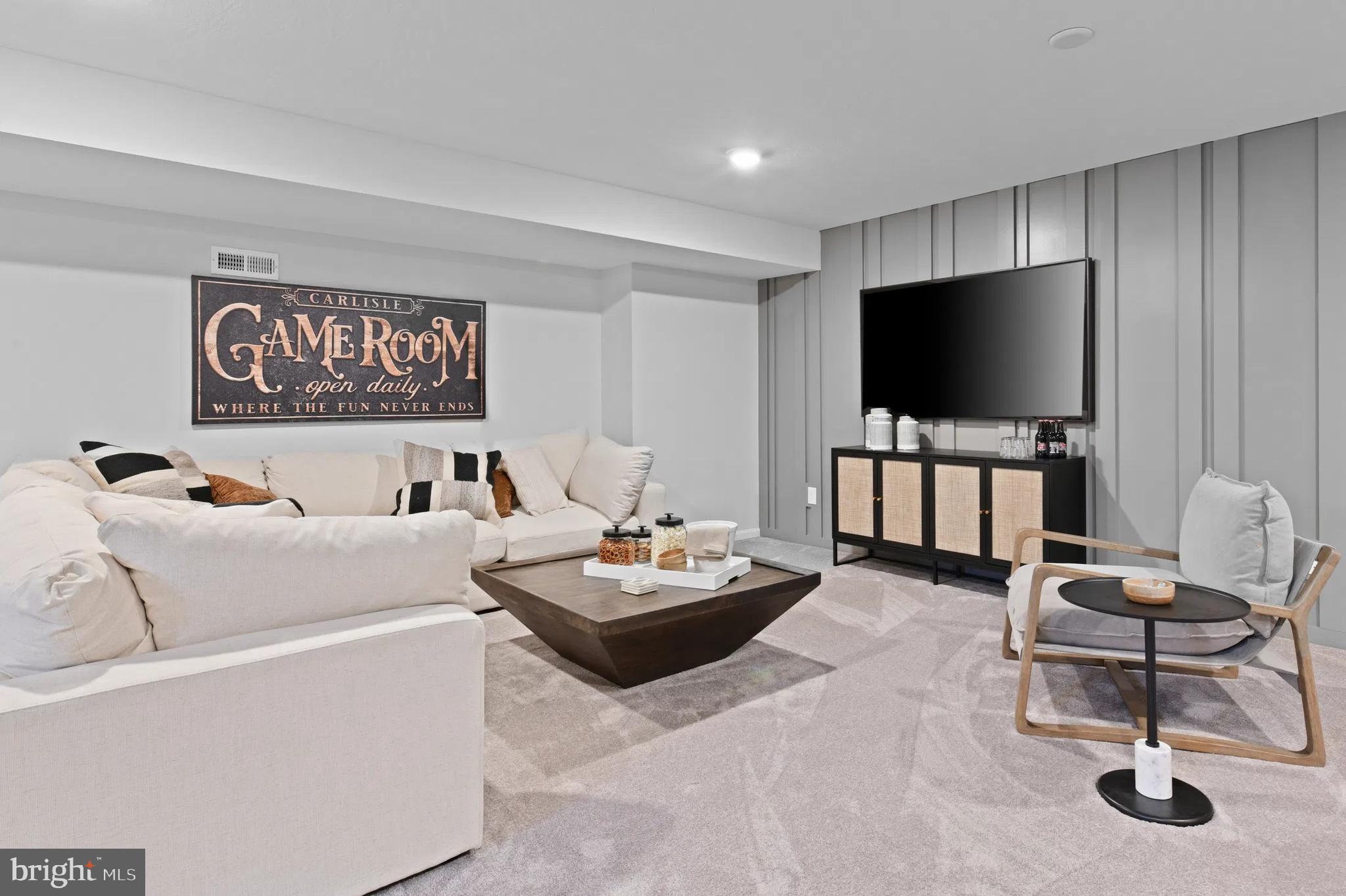 3 Bowens Run Road Bealeton, VA 22712 - Photo 14 of 14 a living room with furniture and a flat screen tv