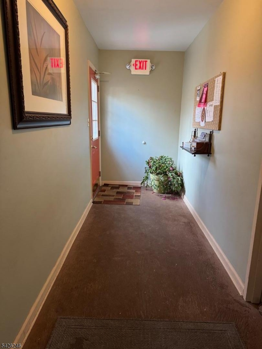 630 Valley Road Gillette, NJ 07933 - Photo 16 of 30 a room with painting on the wall and a window