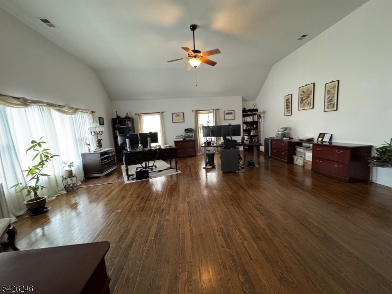 630 Valley Road Gillette, NJ 07933 - Photo 19 of 30 a living room with furniture and wooden floor