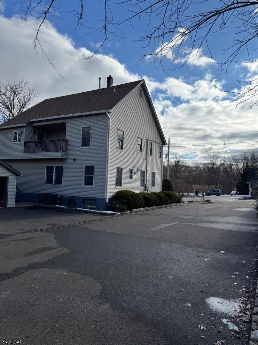 630 Valley Road Gillette, NJ 07933 - Photo 29 of 30 a front view of a house with a yard