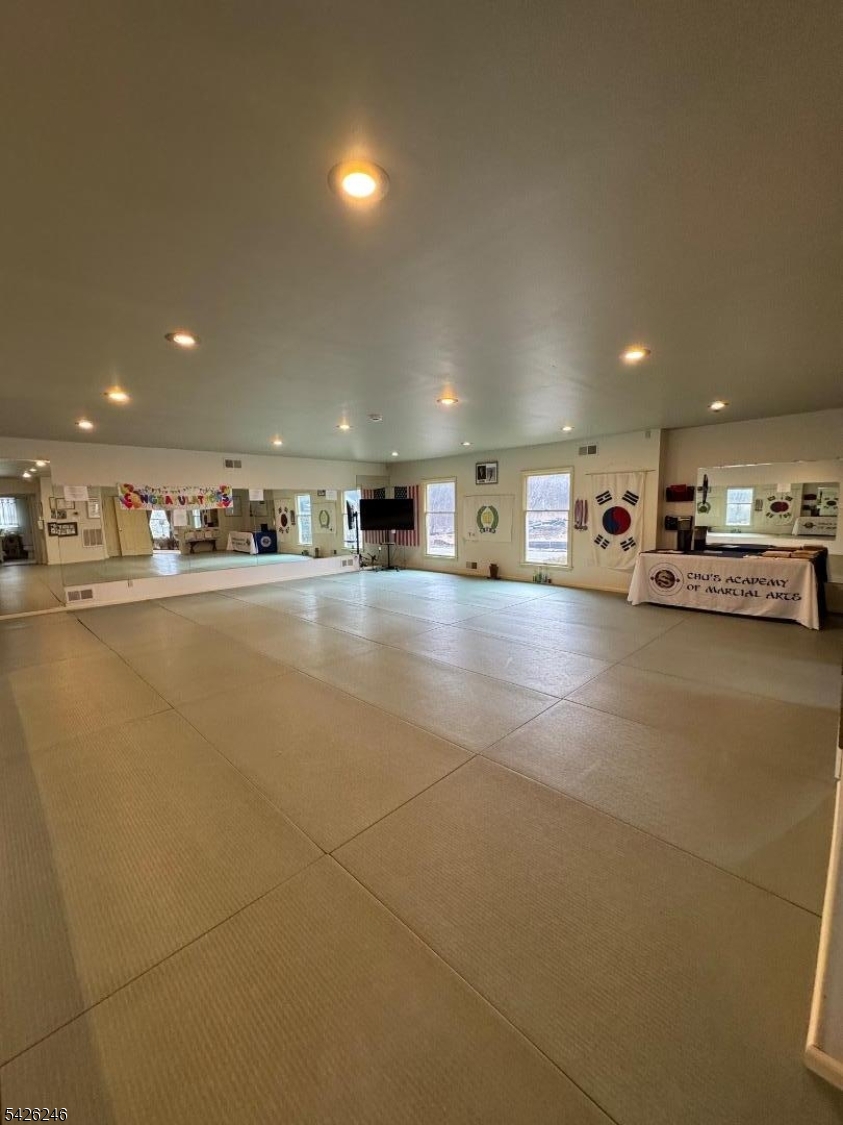 630 Valley Road Gillette, NJ 07933 - Photo 8 of 30 a view of a room with gym equipment
