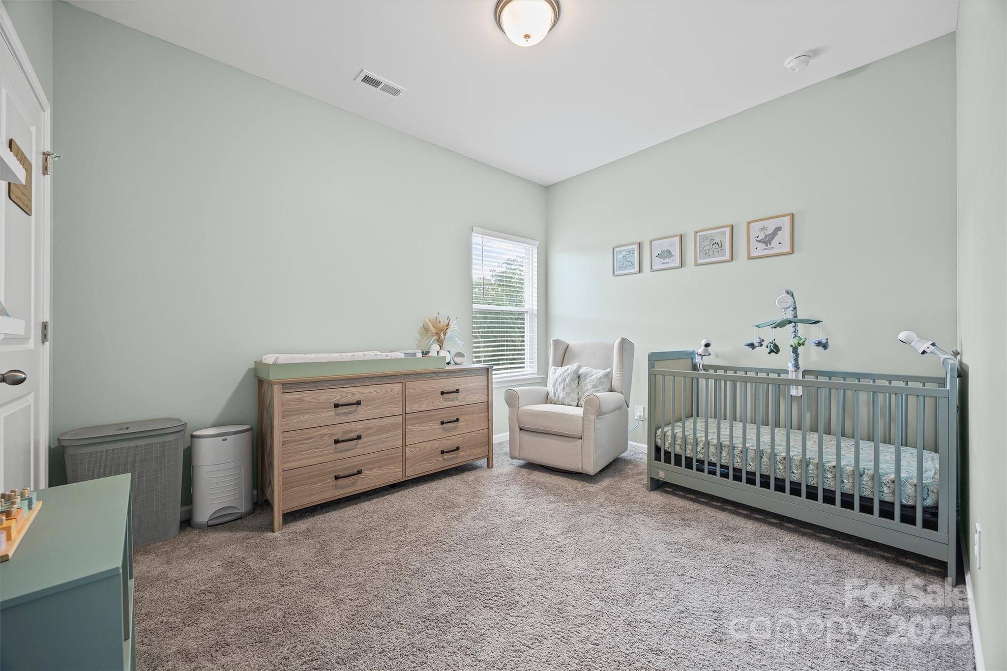 328 Cold Crk Way Mount Holly, NC 28120 - Photo 13 of 24 a bed room with furniture and a window