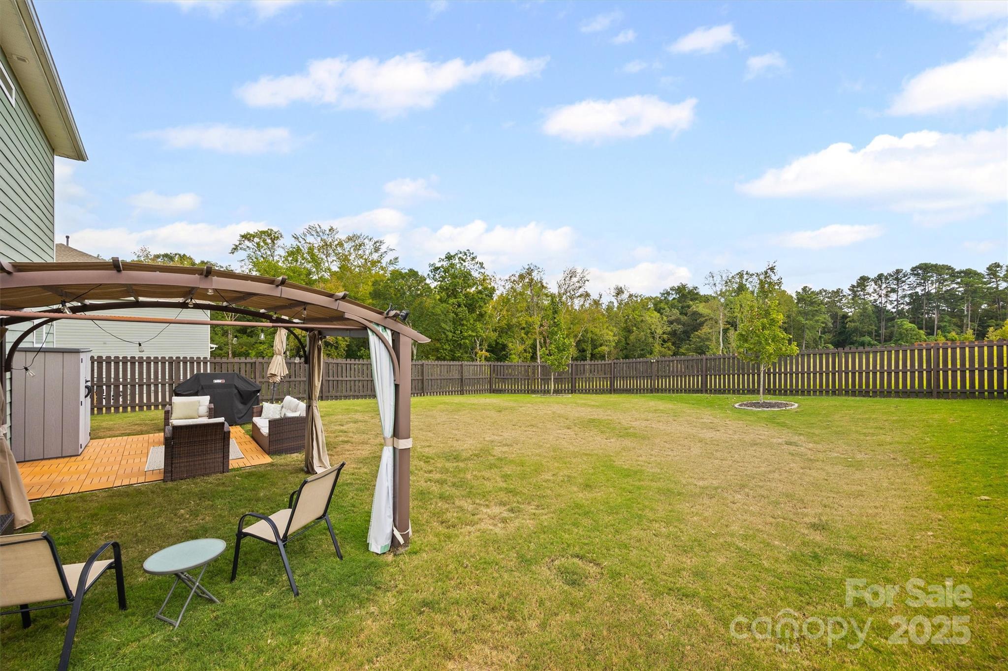 328 Cold Crk Way Mount Holly, NC 28120 - Photo 16 of 24 a view of a lake with a yard