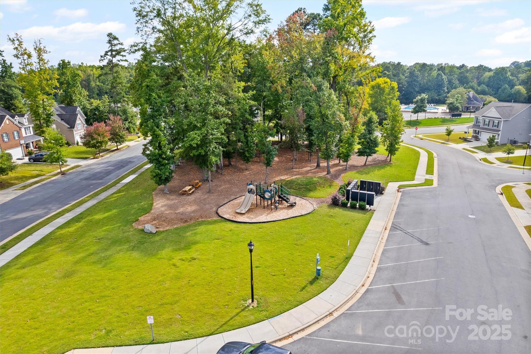 328 Cold Crk Way Mount Holly, NC 28120 - Photo 17 of 24 a view of a swimming pool with chairs