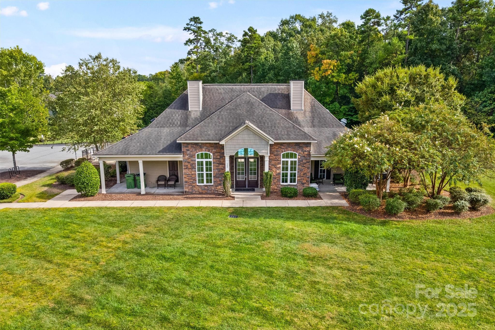 328 Cold Crk Way Mount Holly, NC 28120 - Photo 20 of 24 a front view of a house with swimming pool having outdoor seating