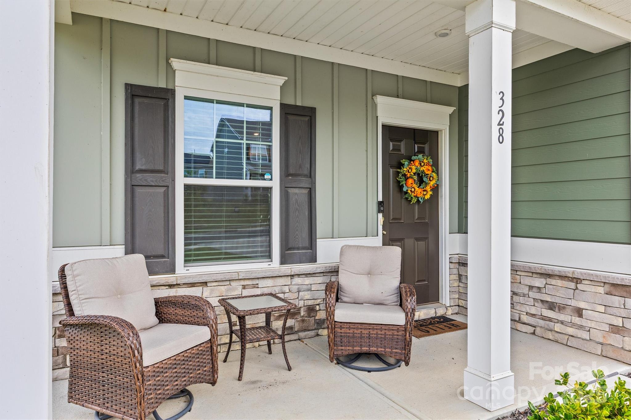 328 Cold Crk Way Mount Holly, NC 28120 - Photo 2 of 24 a outdoor living space with furniture and a window