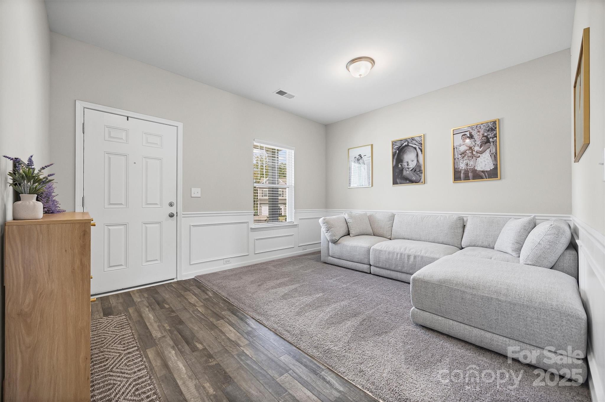 328 Cold Crk Way Mount Holly, NC 28120 - Photo 7 of 24 a living room with furniture and a window