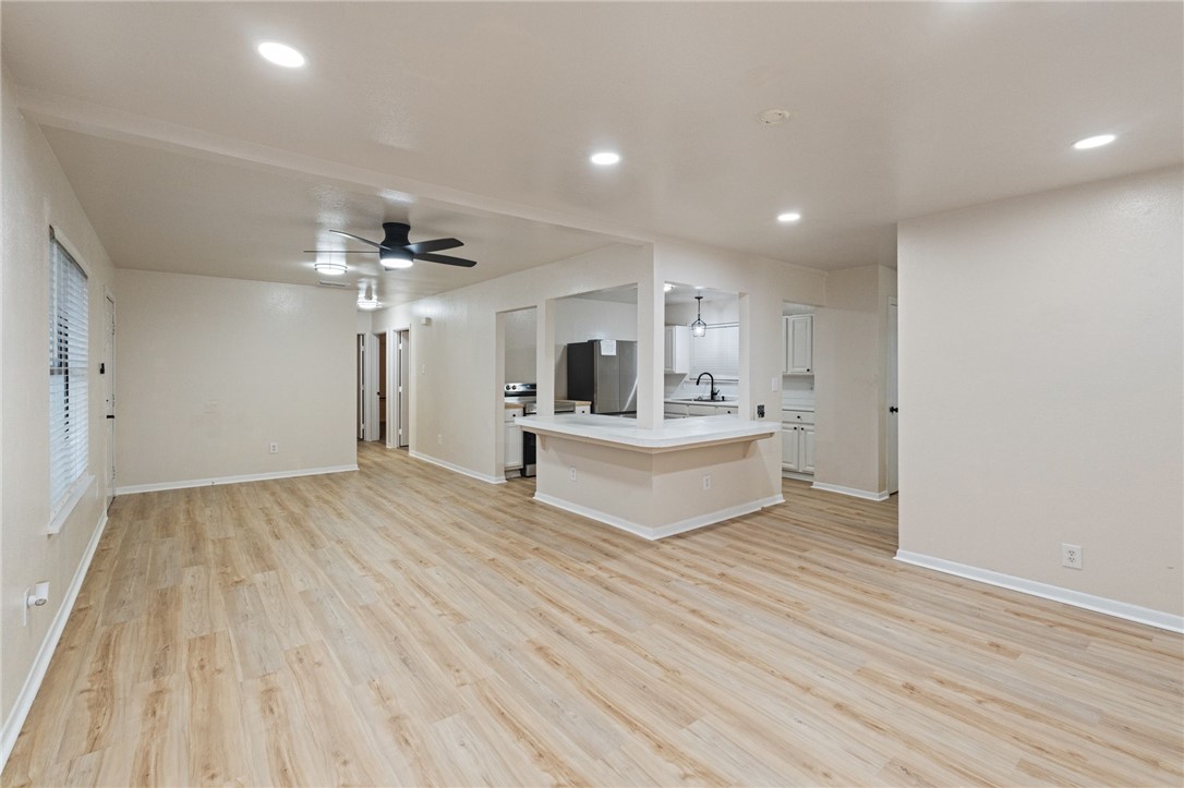 5921 Riley Drive Corpus Christi, TX 78412 - Photo 4 of 20 a view of kitchen with sink microwave and refrigerator