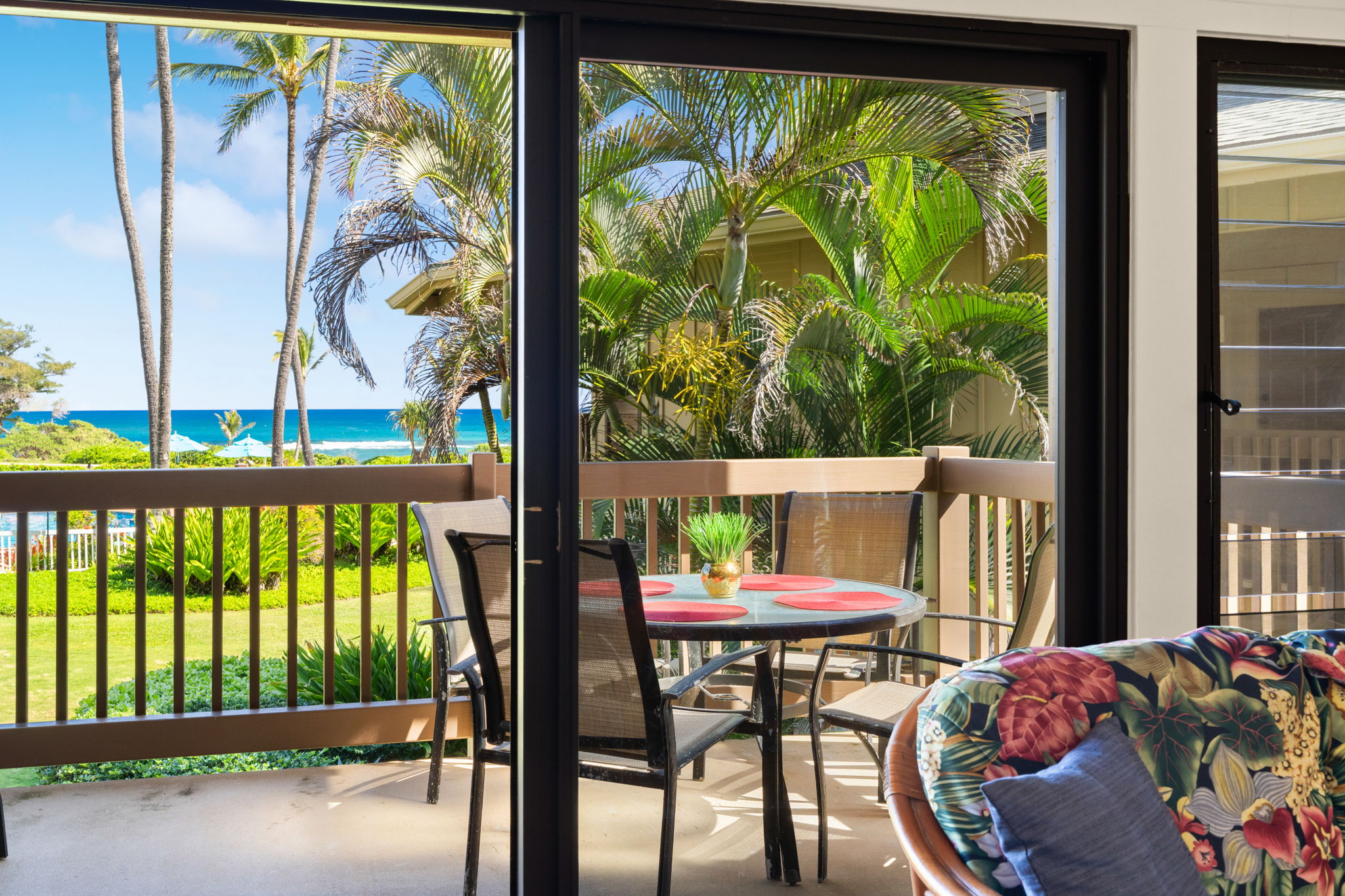 4460 Nehe Road, Unit 203 Lihue, HI 96766 - Photo 11 of 26 a view of a chairs and table in patio