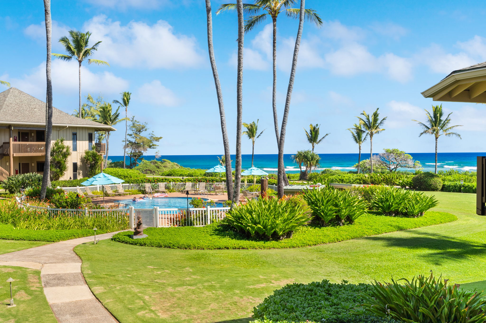 4460 Nehe Road, Unit 203 Lihue, HI 96766 - Photo 3 of 26 a view of a garden