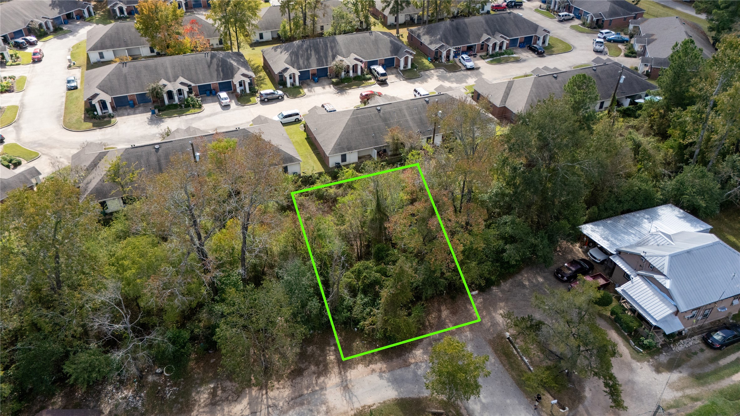 0 South Sandra Street Conroe, TX 77301 - Photo 12 of 14 an aerial view of residential house with outdoor space and swimming pool