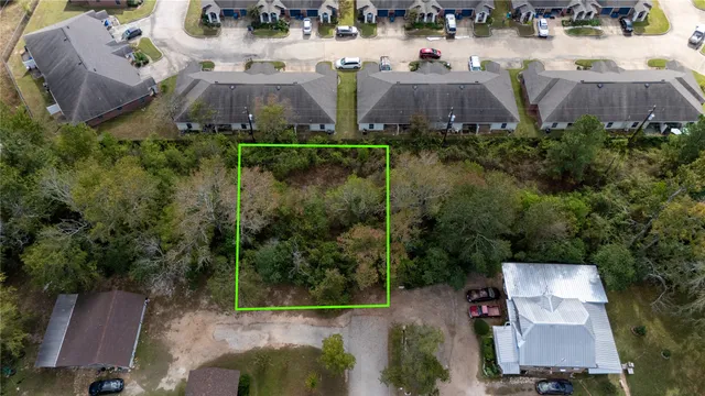 an aerial view of house with yard and outdoor space