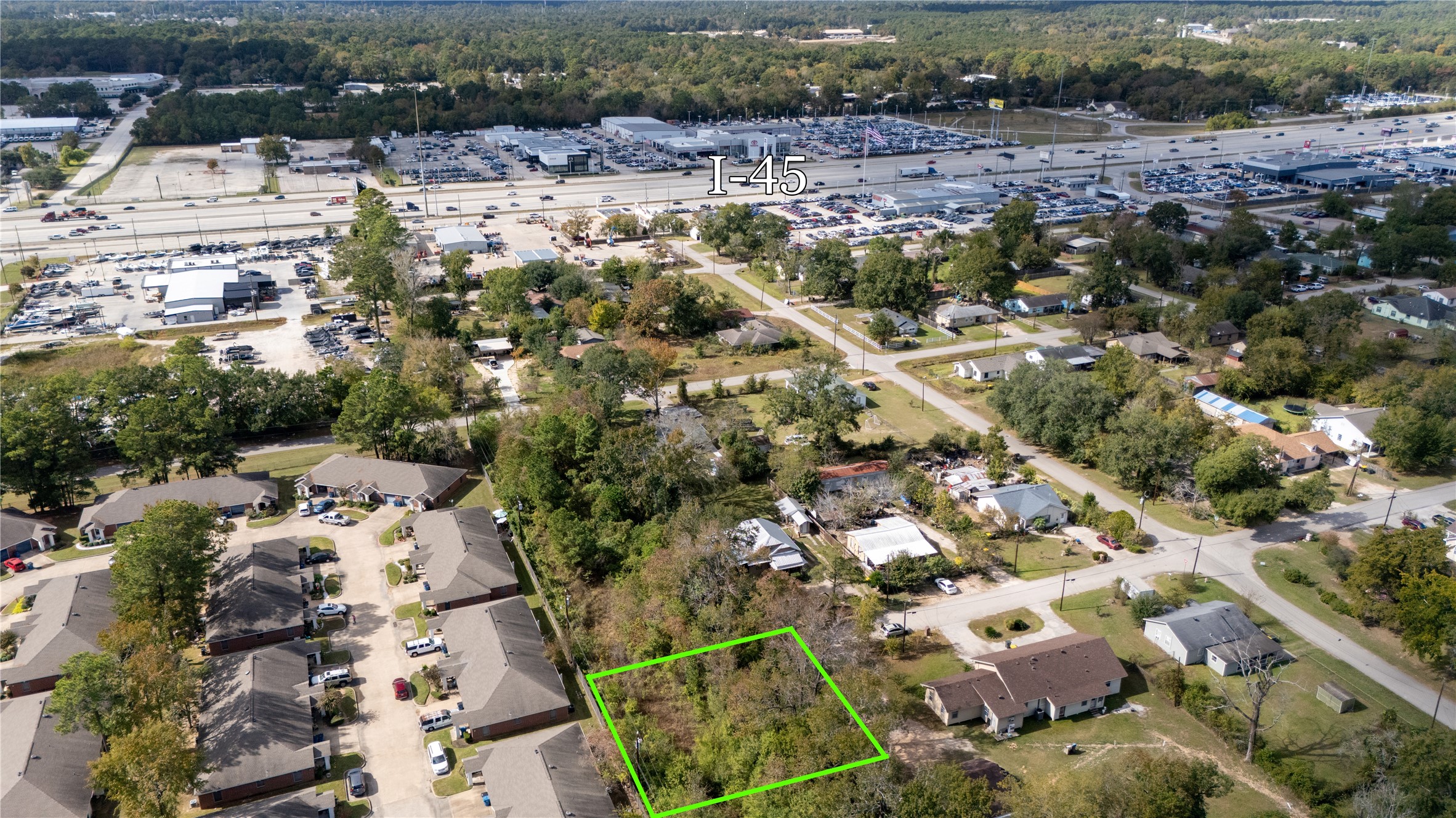 0 South Sandra Street Conroe, TX 77301 - Photo 5 of 14 an aerial view of residential houses with outdoor space