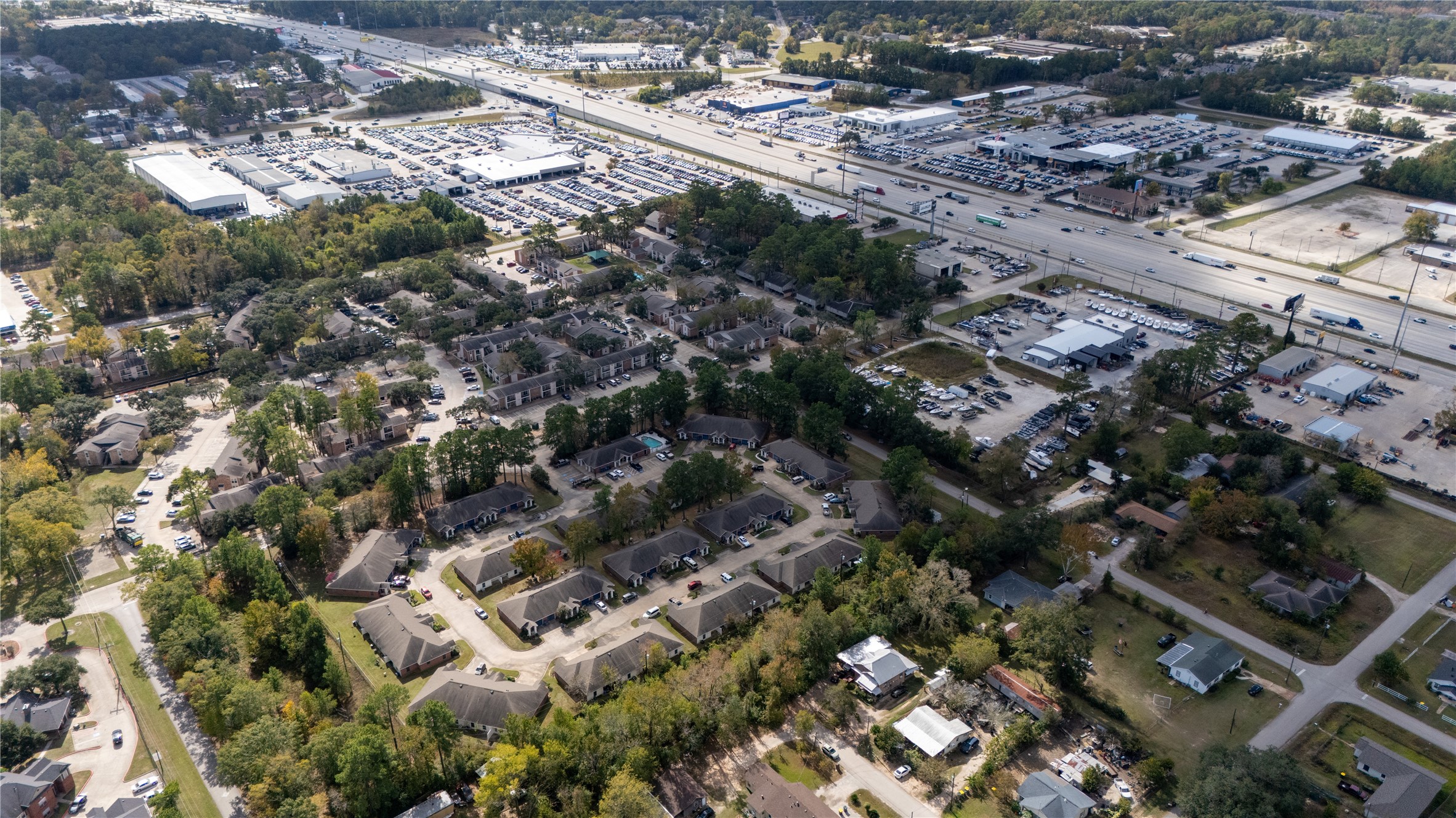 0 South Sandra Street Conroe, TX 77301 - Photo 9 of 14 an aerial view of residential houses with outdoor space