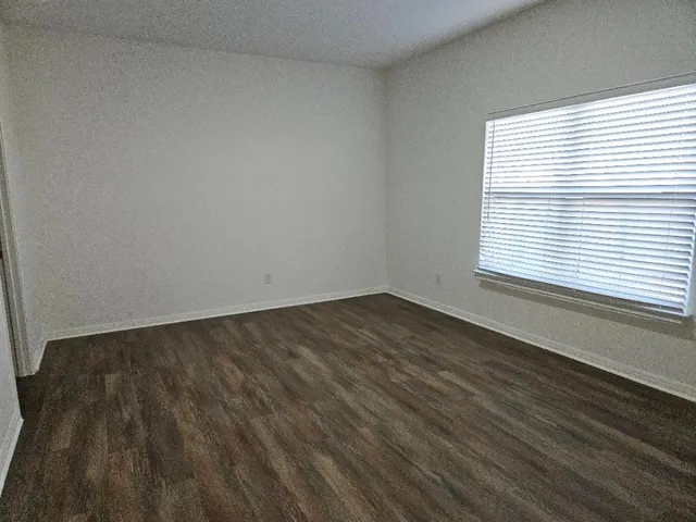 a kitchen with a sink stove and refrigerator