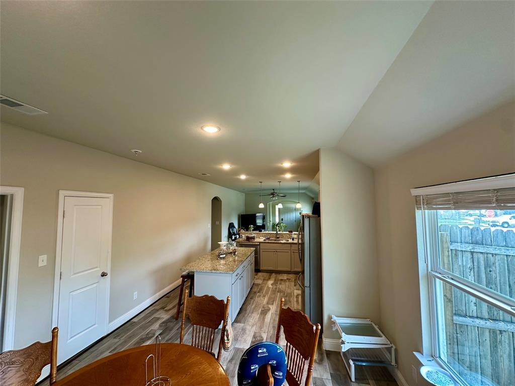 2801 Stuart Drive Fort Worth, TX 76104 - Photo 17 of 39 a living room with furniture and a wooden floor