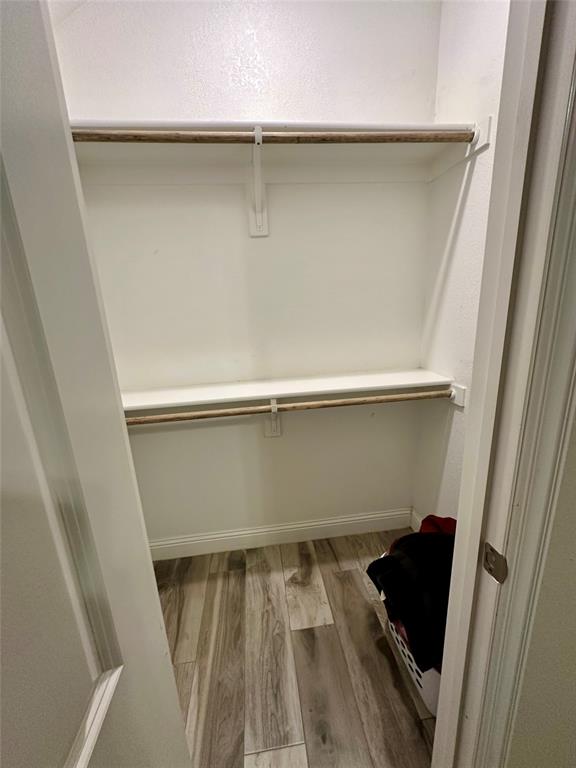 2801 Stuart Drive Fort Worth, TX 76104 - Photo 23 of 39 an empty room with wooden floor