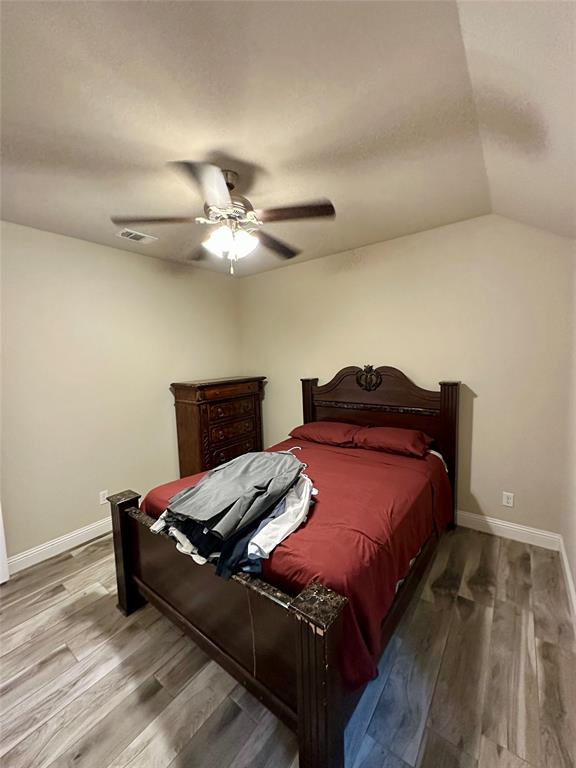 2801 Stuart Drive Fort Worth, TX 76104 - Photo 24 of 39 a bedroom with bed and window