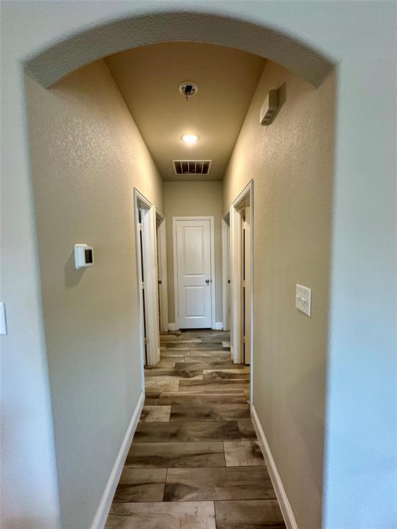 2801 Stuart Drive Fort Worth, TX 76104 - Photo 28 of 39 a view of gallery with wooden floor