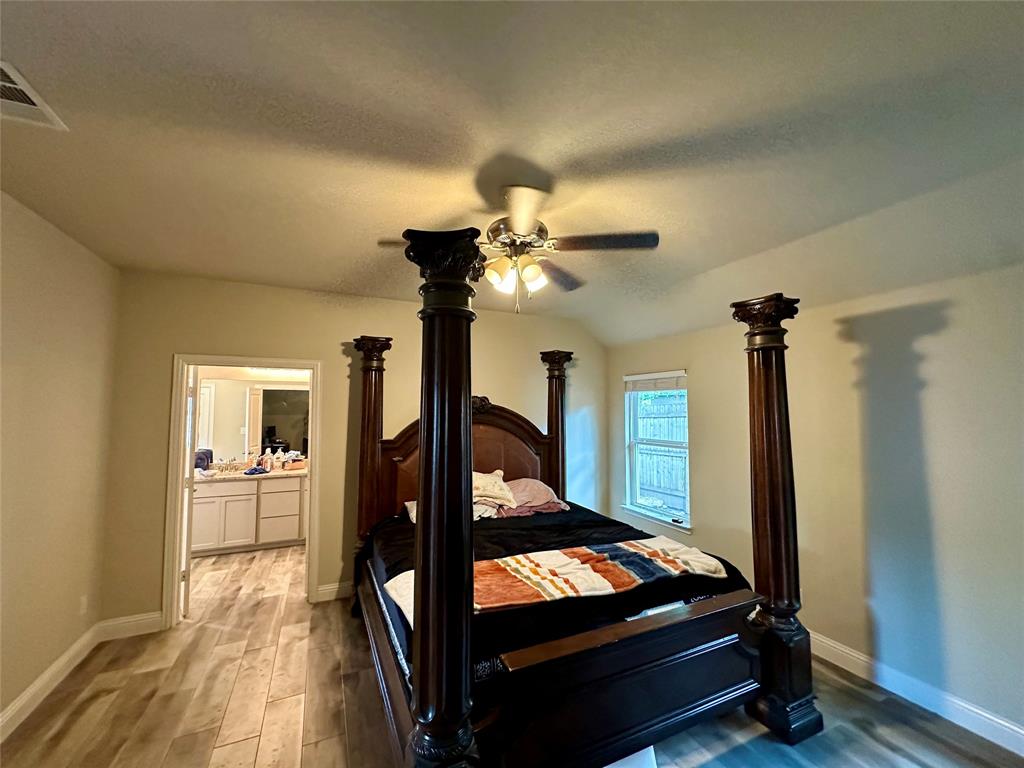 2801 Stuart Drive Fort Worth, TX 76104 - Photo 30 of 39 a room with furniture and a window