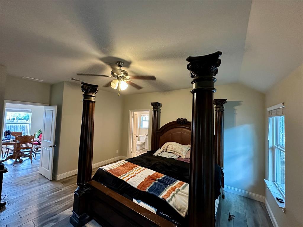 2801 Stuart Drive Fort Worth, TX 76104 - Photo 31 of 39 a bedroom with furniture and a window