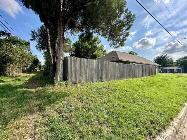 a view of a backyard with a garden