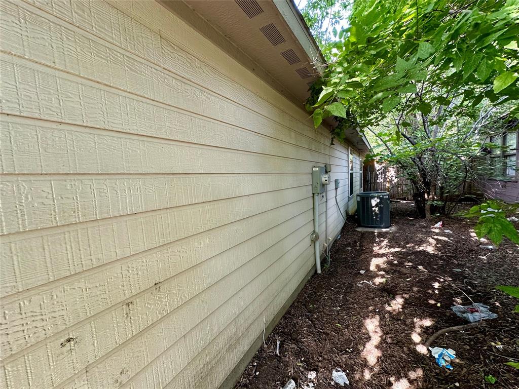 2801 Stuart Drive Fort Worth, TX 76104 - Photo 5 of 39 a pathway of a house with a trees