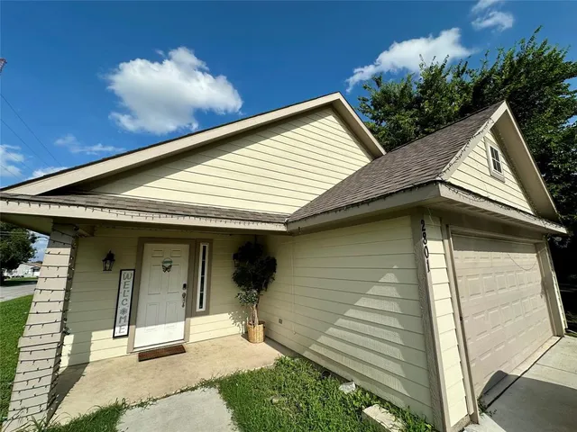 a view of a house with a patio