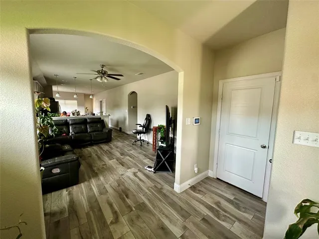 a view of a livingroom with furniture and a livingroom