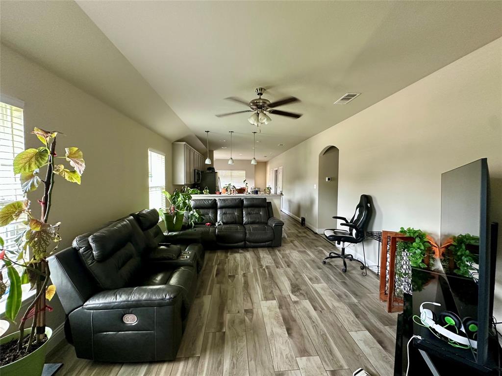 2801 Stuart Drive Fort Worth, TX 76104 - Photo 10 of 39 a living room with furniture and a wooden floor