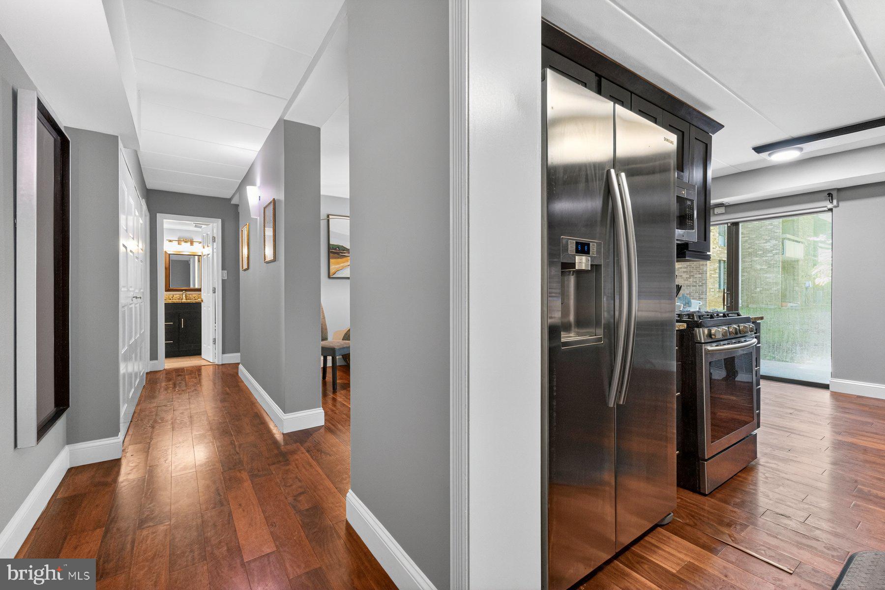 2330 Freetown Court, Unit 4/1B Reston, VA 20191 - Photo 11 of 26 Hallway and kitchen