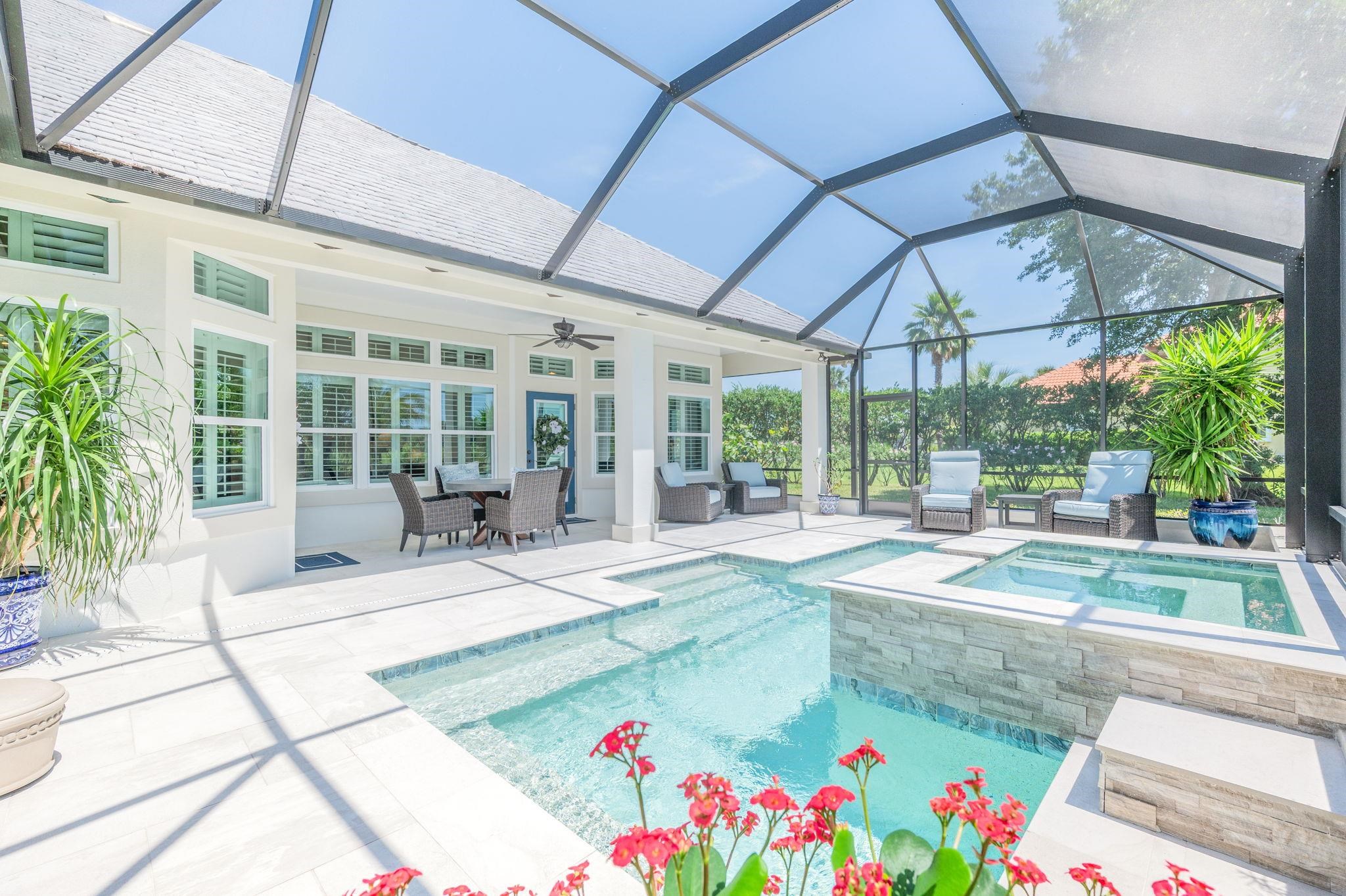 248 Marshside Drive St. Augustine, FL 32080 - Photo 61 of 78 a building outdoor space with patio furniture and potted plants