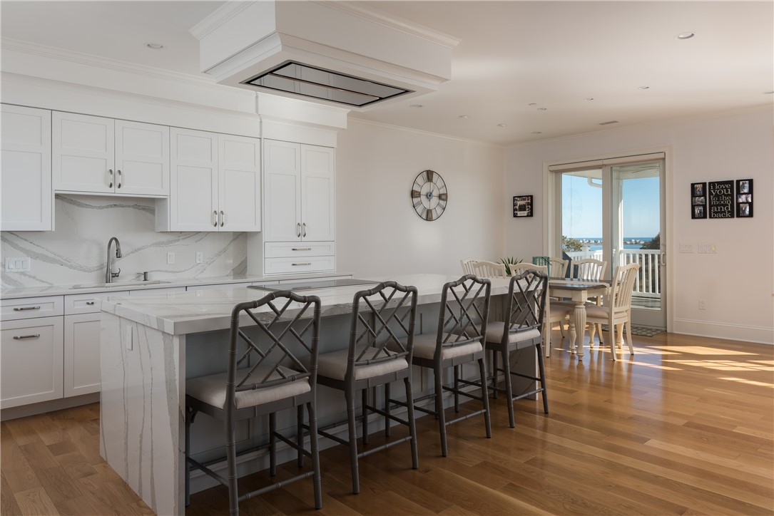 3 Compass Way, Unit B301 Westerly, RI 02891 - Photo 8 of 33 Kitchen and expansive waterfall kitchen island