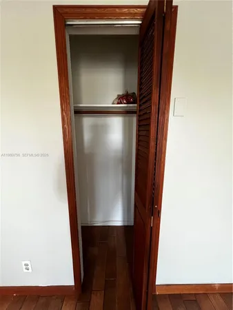 a stove top oven sitting inside of a kitchen