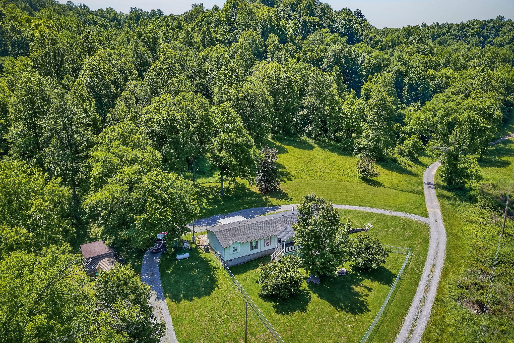 16130 Buffalo Valley Road Silver Point, TN 38582 - Photo 7 of 47 an aerial view of a house with a yard