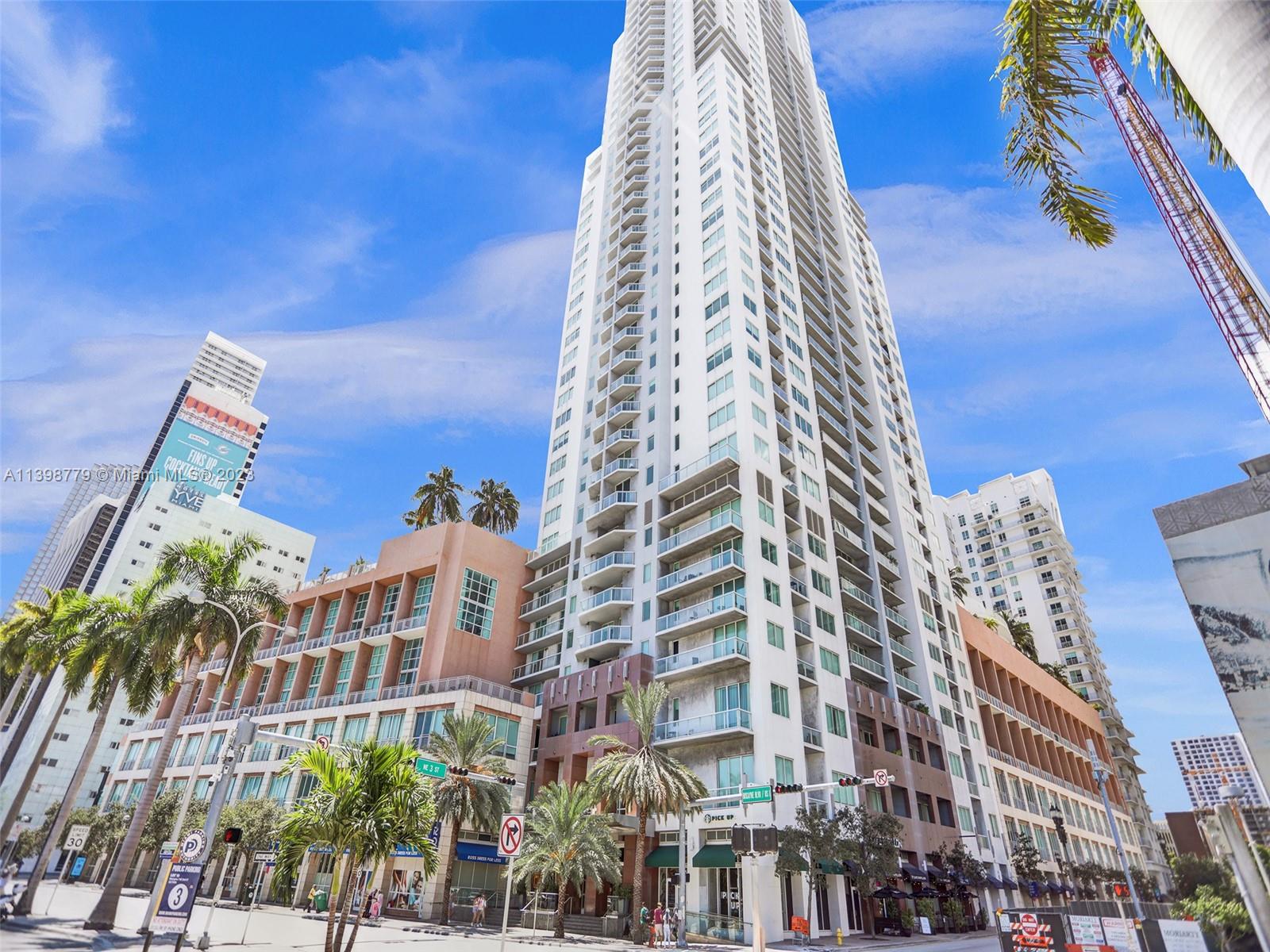 244 Biscayne Boulevard, Unit 439 Miami, FL 33132 - Photo 1 of 49 a front view of a multi story building