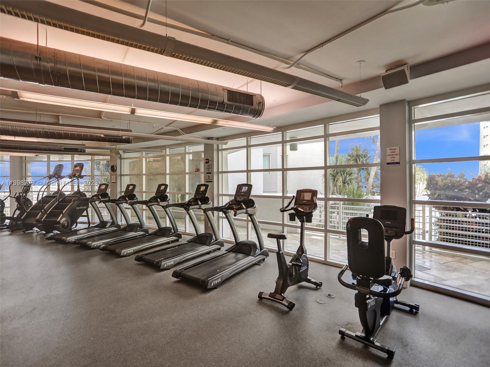 244 Biscayne Boulevard, Unit 439 Miami, FL 33132 - Photo 47 of 49 a view of a room with gym equipment