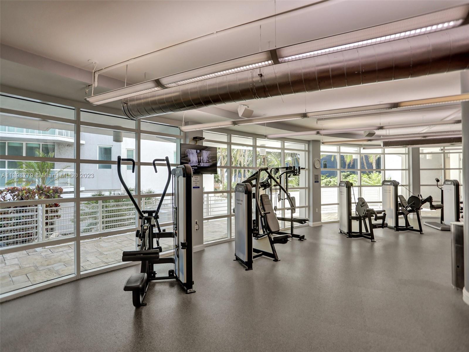 244 Biscayne Boulevard, Unit 439 Miami, FL 33132 - Photo 49 of 49 a view of a room with gym equipment