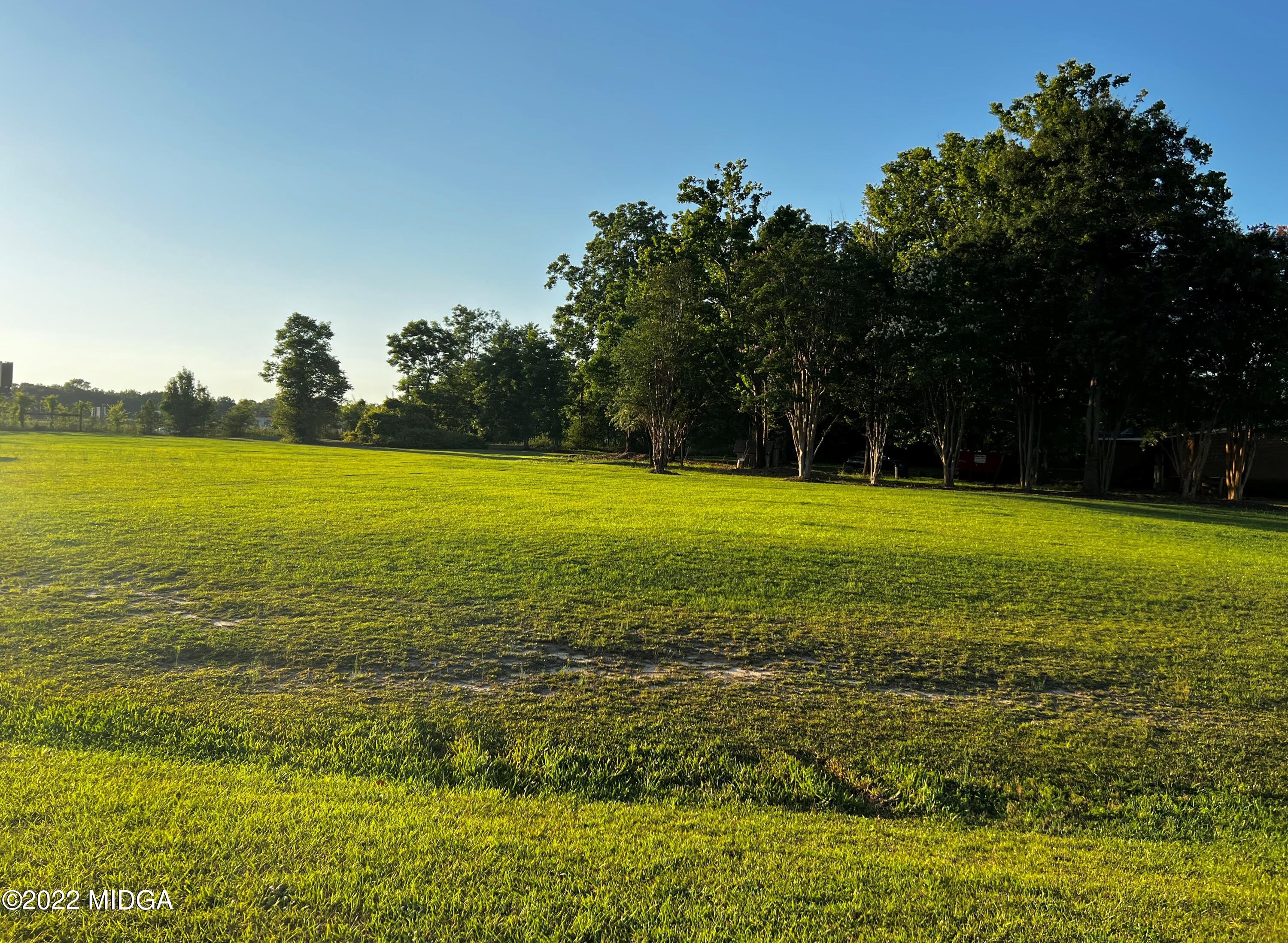 6509 Skipper Road Macon, GA 31216 - Photo 11 of 28 a view of an ocean with a trees in the background