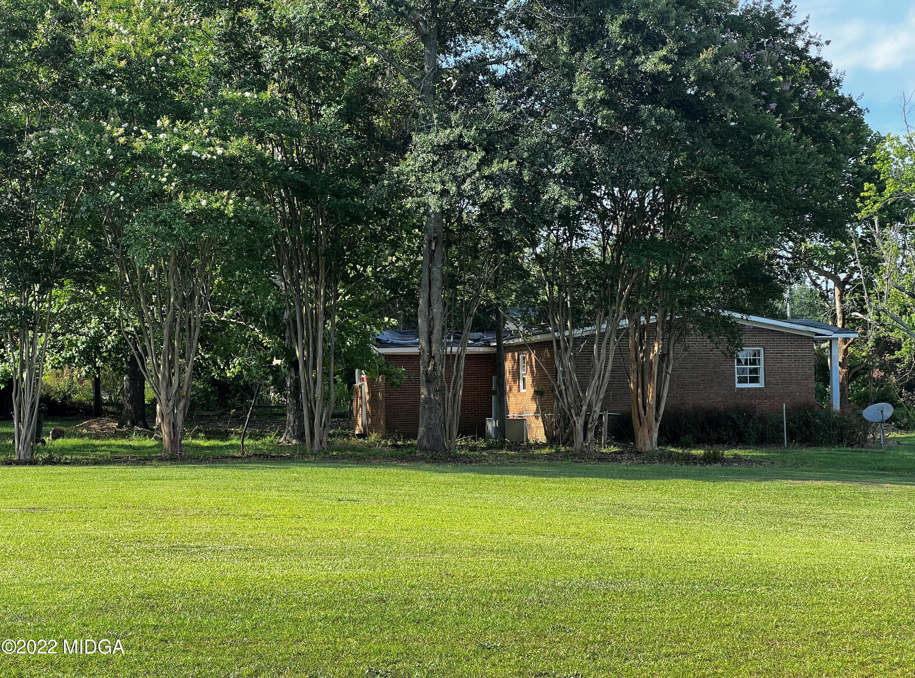 6509 Skipper Road Macon, GA 31216 - Photo 28 of 28 a front view of a house with a yard