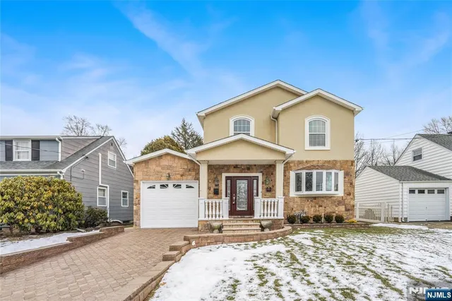 front view of a house with a street
