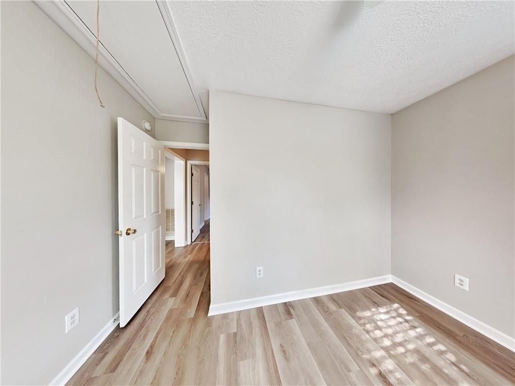 729 Cooper Street Southwest Atlanta, GA 30315 - Photo 13 of 20 a view of hallway with wooden floor