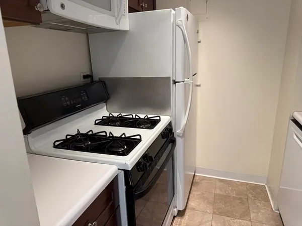 a kitchen with a sink and a stove